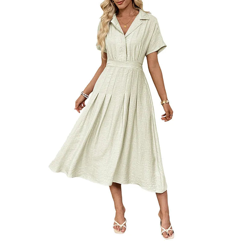 Light green lapel shirt dress with waist-tight skirt and pocket for office wear.