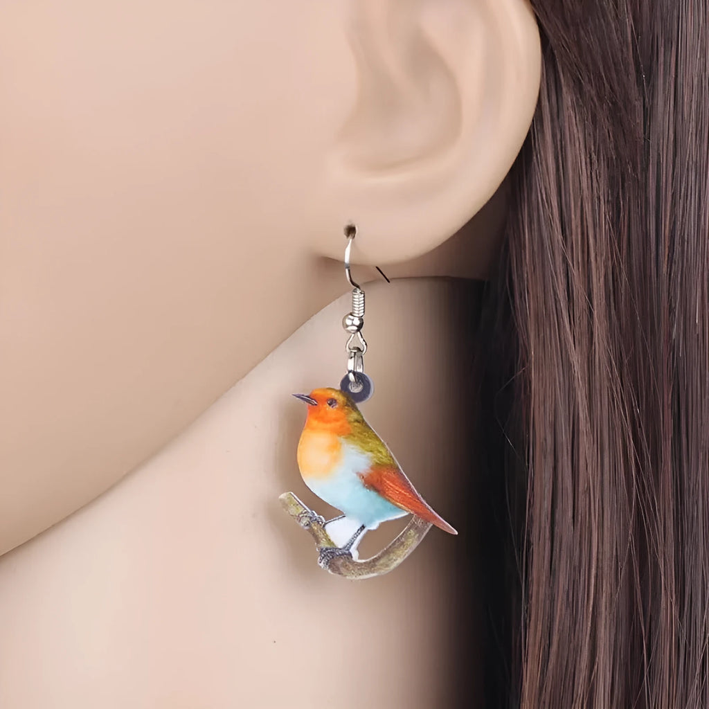 Blue Titmouse acrylic pendant earrings with geometric animal zodiac design and snake elements
