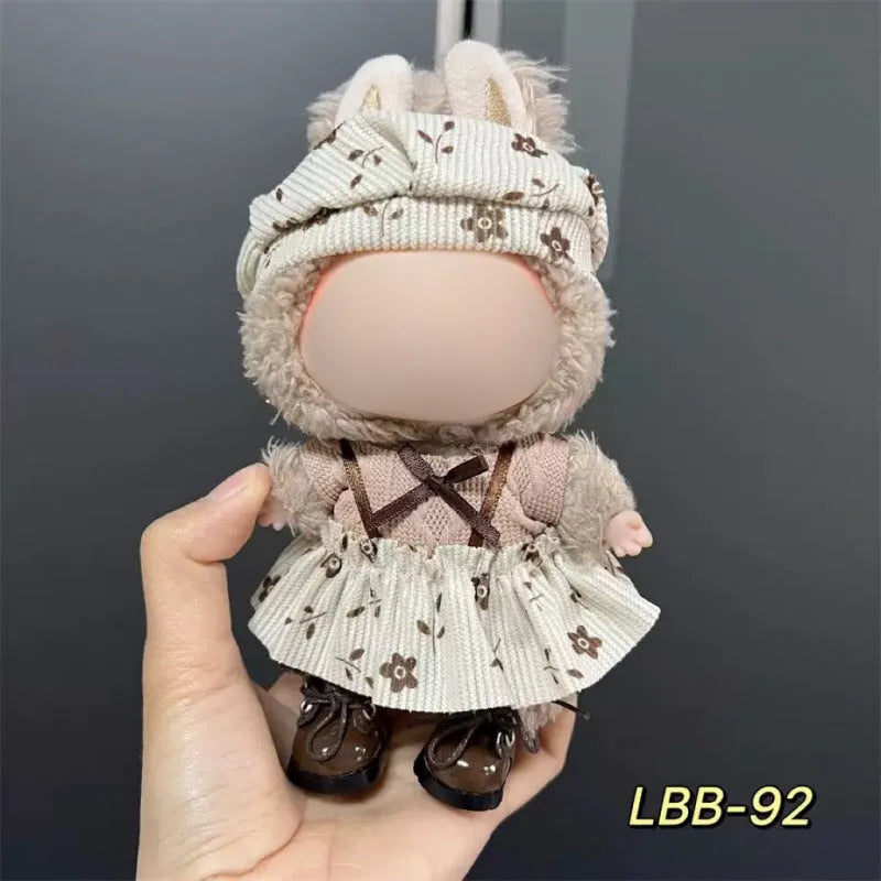 Plastic doll clothes costume for a 17cm vinyl action figure on a white background