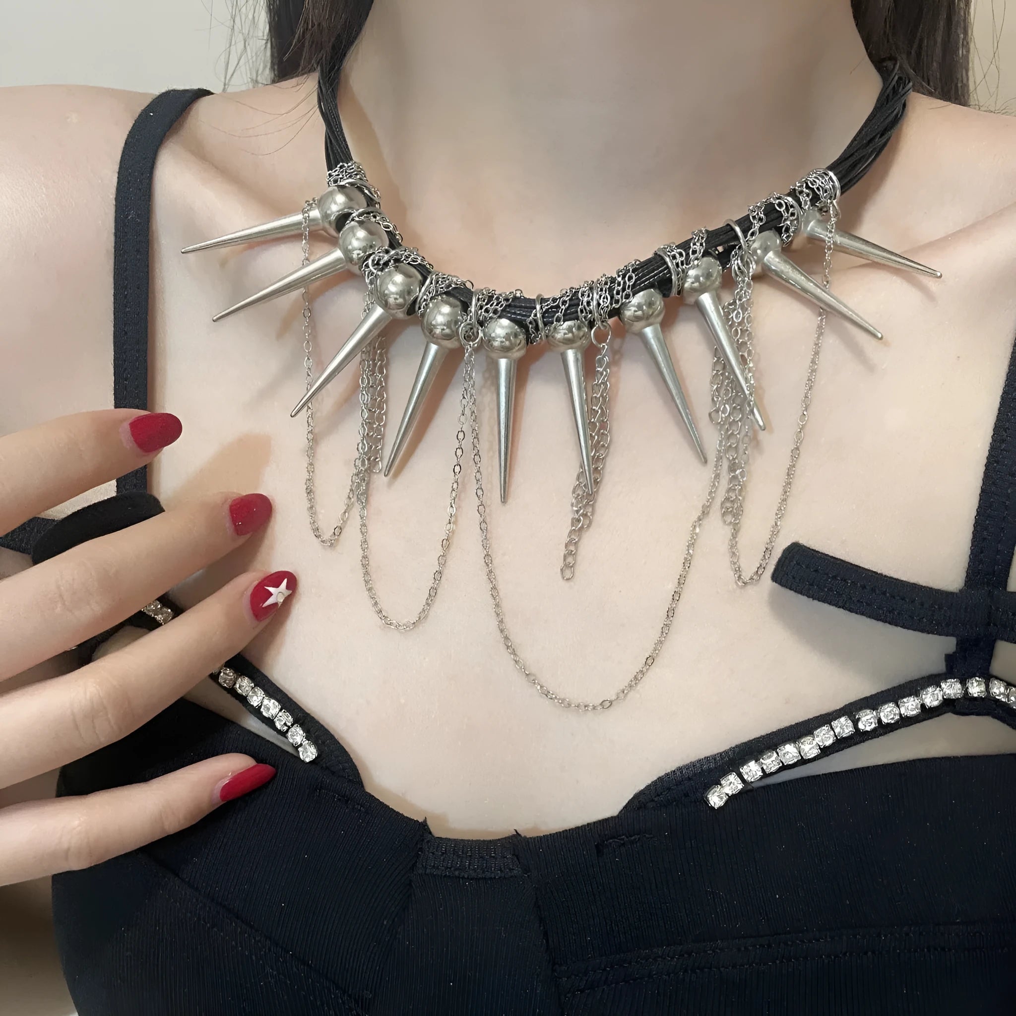 Women's casual leather necklace with winding round beads, tassel pendant, and silver rivet details