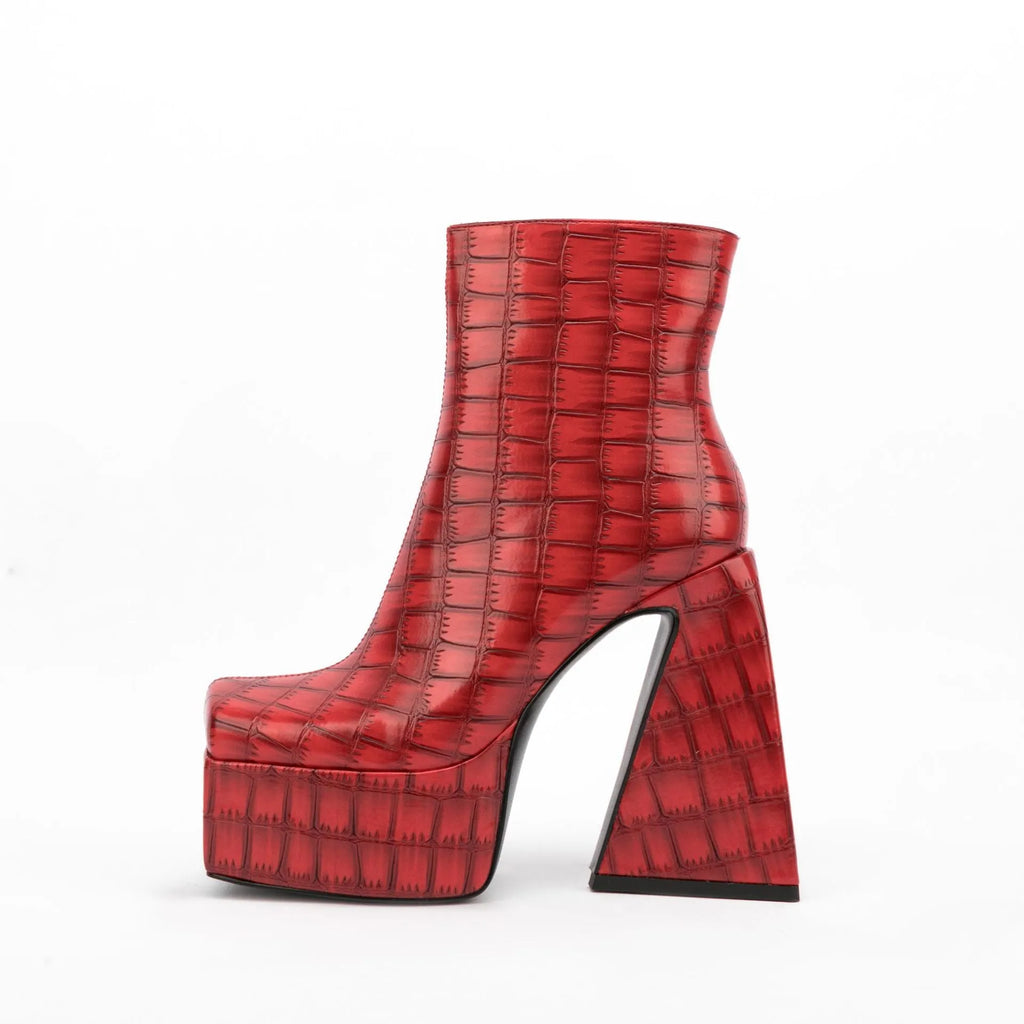 Women's artificial PU ankle boot with a super high heel in solid beige colour