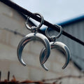 Silver geometric hoop earrings with moon design showing Gothic vintage style