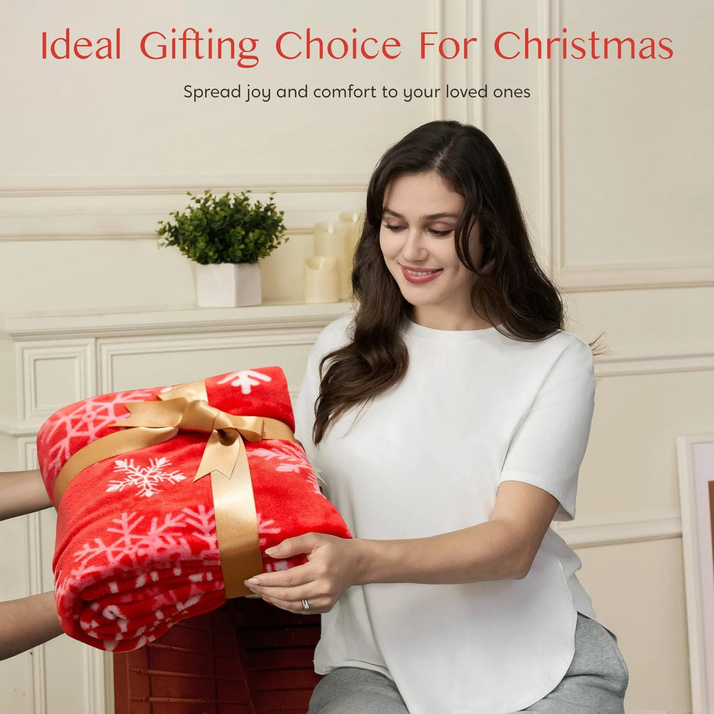 Soft flannel Christmas blanket in a solid colour, shown folded to display its plush texture and American style.