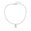 White necklace with a conch shell pendant made from Mother Pearl shellfish on an electroplated chain.