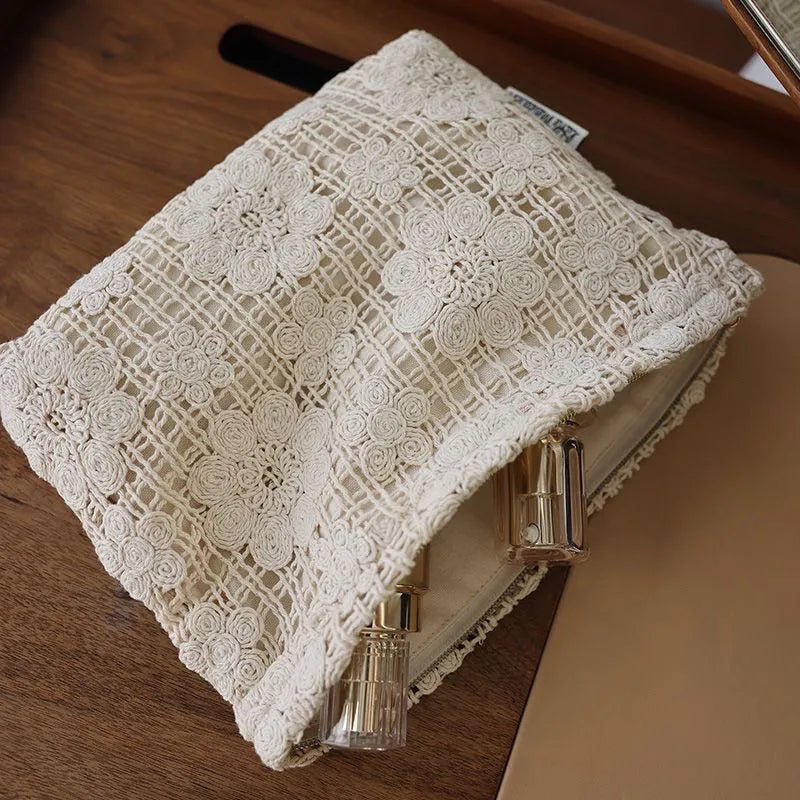 Handmade crocheted hollow flower cosmetic bag in corduroy fabric with ethnic embroidery decoration