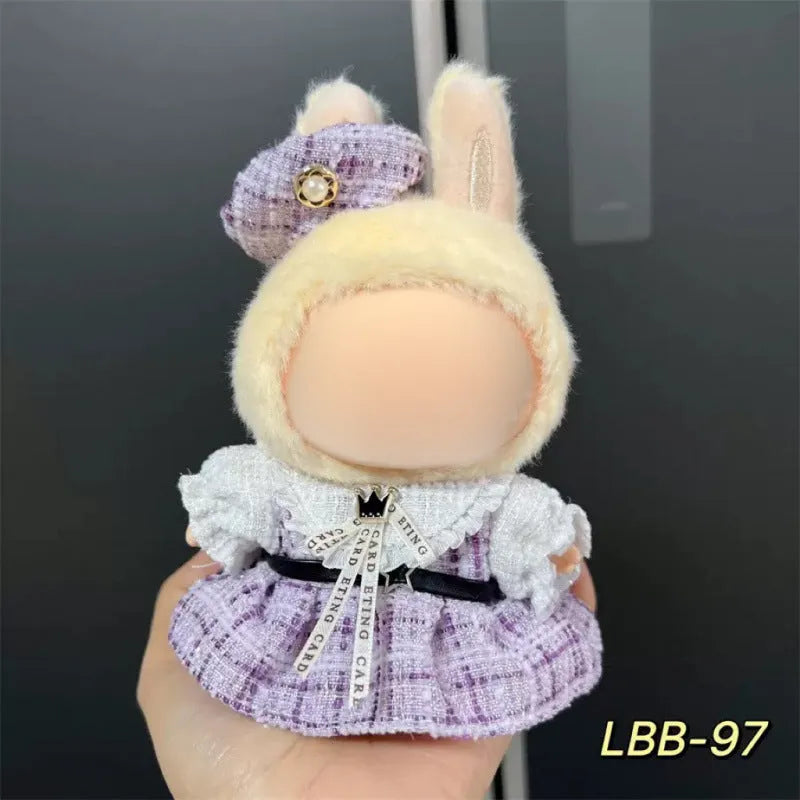 Plastic doll clothes costume for a 17cm vinyl action figure on a white background