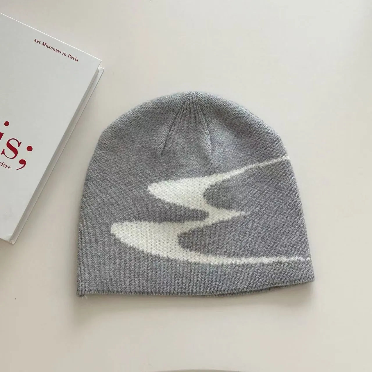 Acrylic thermal beanie hat in black colour for autumn and winter wear