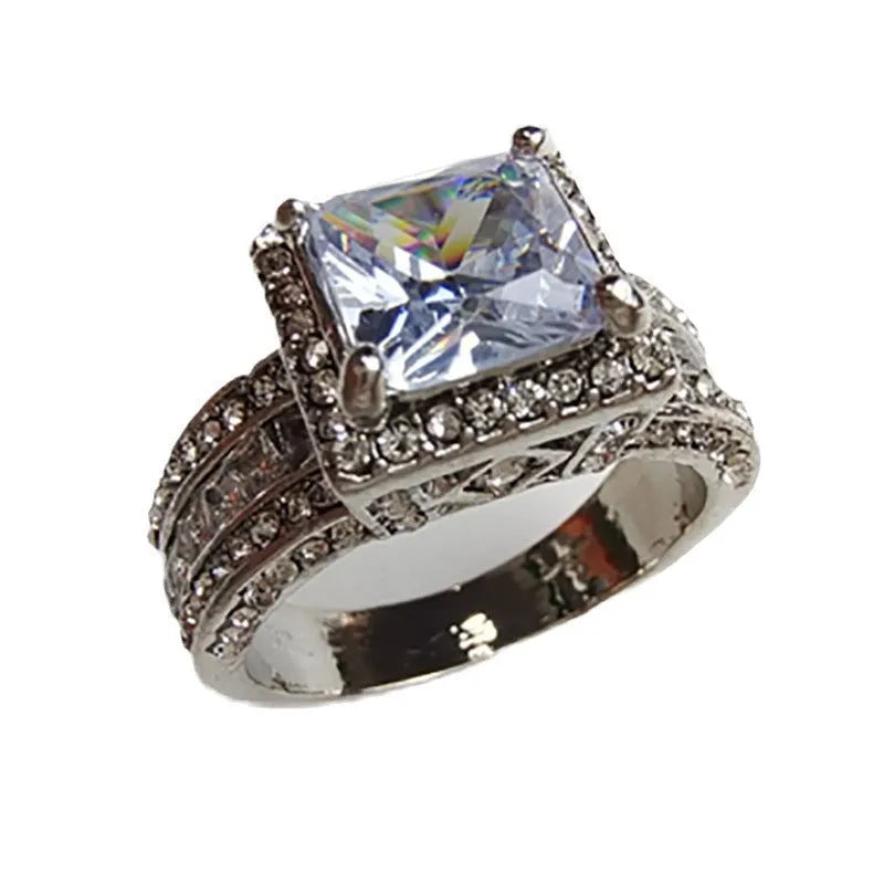 Geometric electroplated fashion ring in gold or white finish, women's sizes 5-13