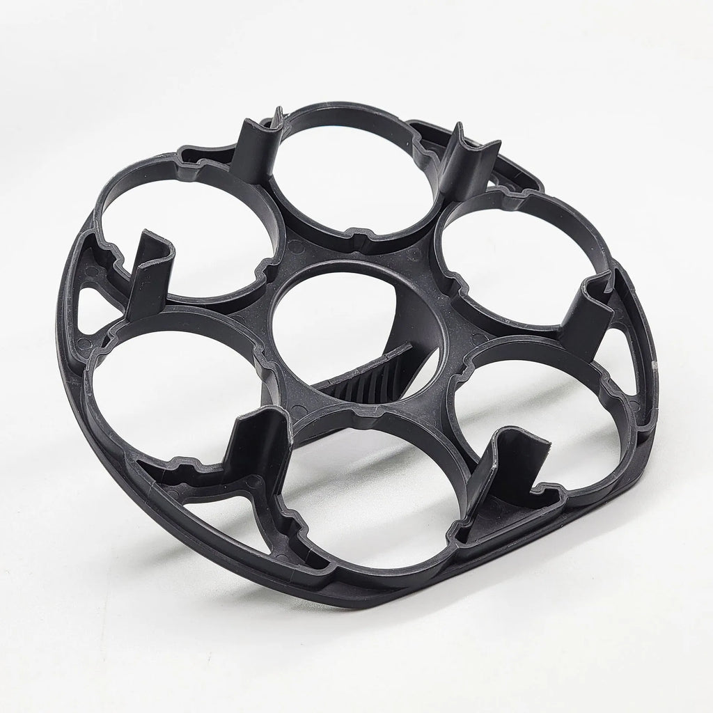 Black plastic egg holder with retainer design for kitchen storage, measuring 13.8cm by 12.6cm
