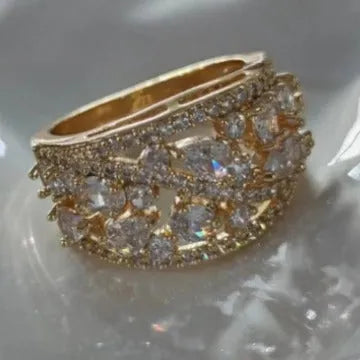 Women's round hollow fashion ring in copper showing openwork design with colour choice options