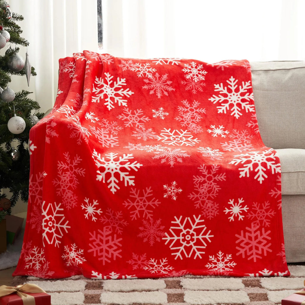 Soft flannel Christmas blanket in a solid colour, shown folded to display its plush texture and American style.