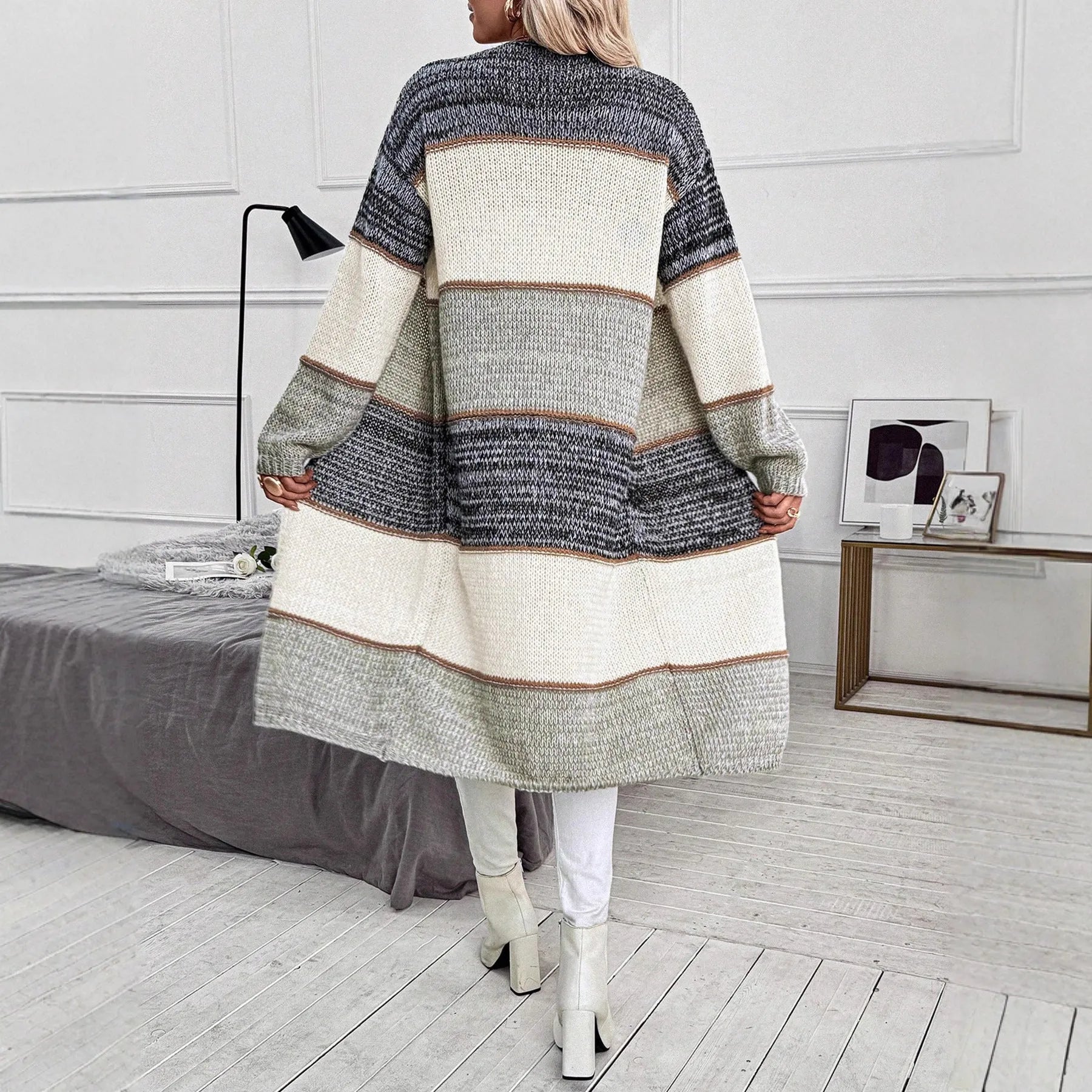 Grey women's knitted cardigan with loose fit and long sleeves