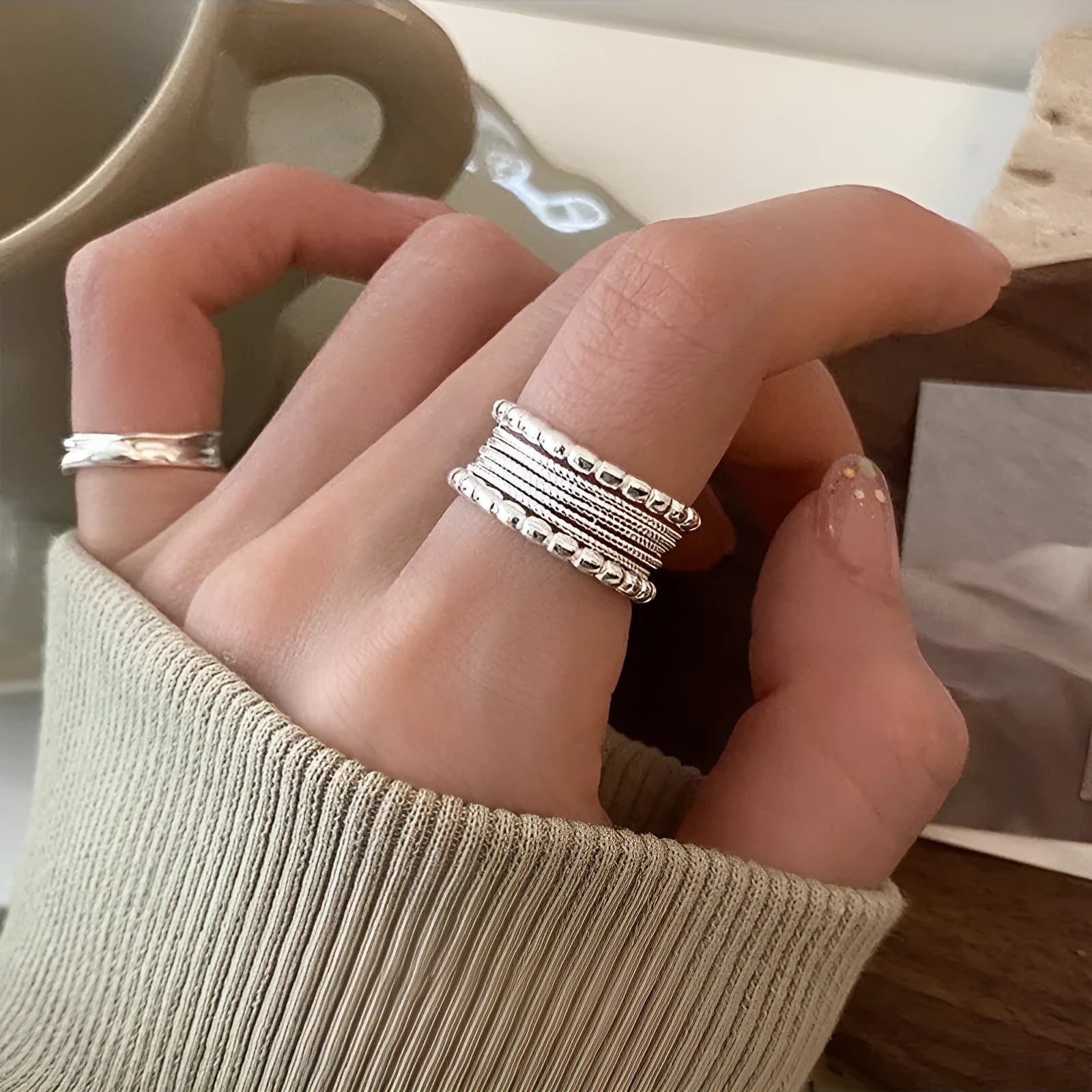 Copper alloy geometric ring with woven twisted multilayer design and adjustable opening