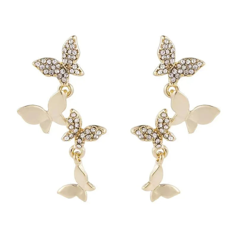 Women's copper butterfly earrings with four butterfly design and gold-coloured drops