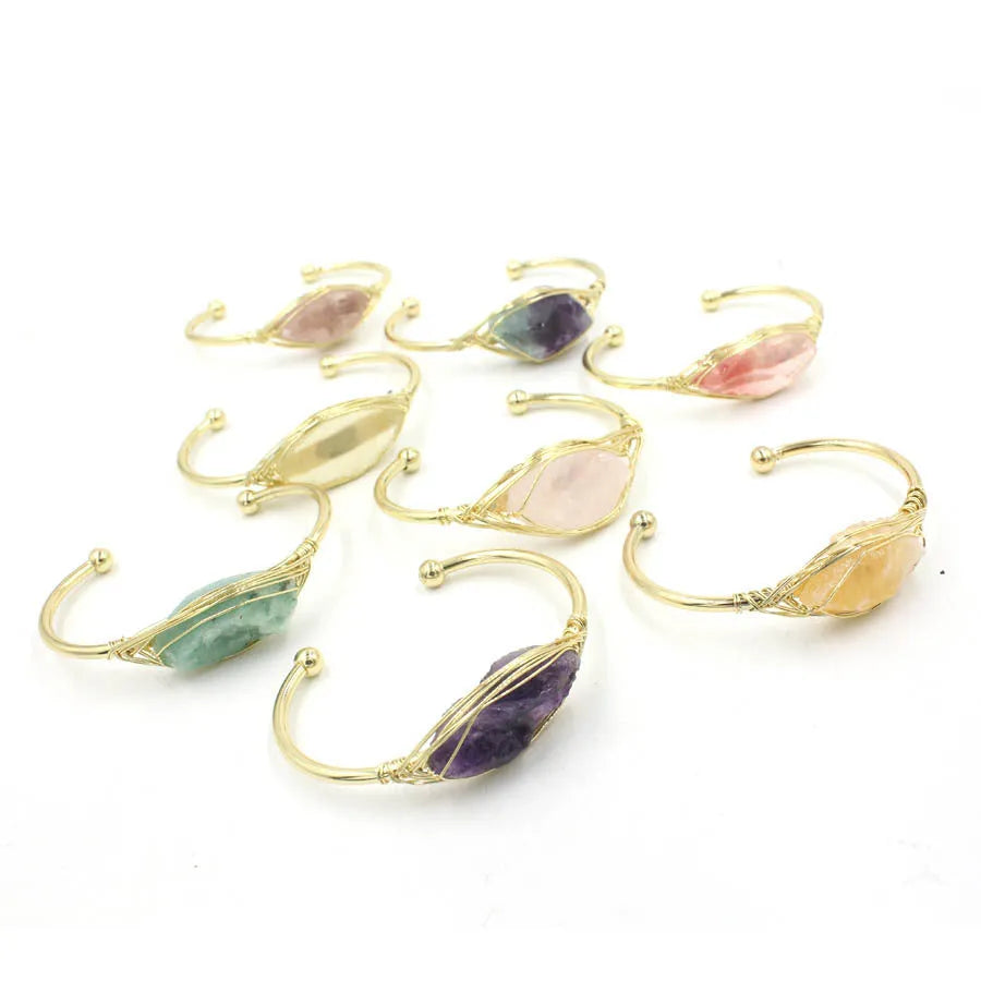 Natural raw gemstone bracelet with amorphous 8mm beads and a simple metal opening clasp.