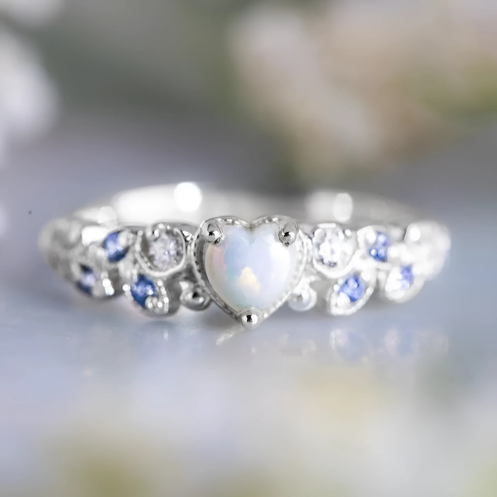 White heart-shaped alloy ring for women, shown in size selection from 5 to 11.