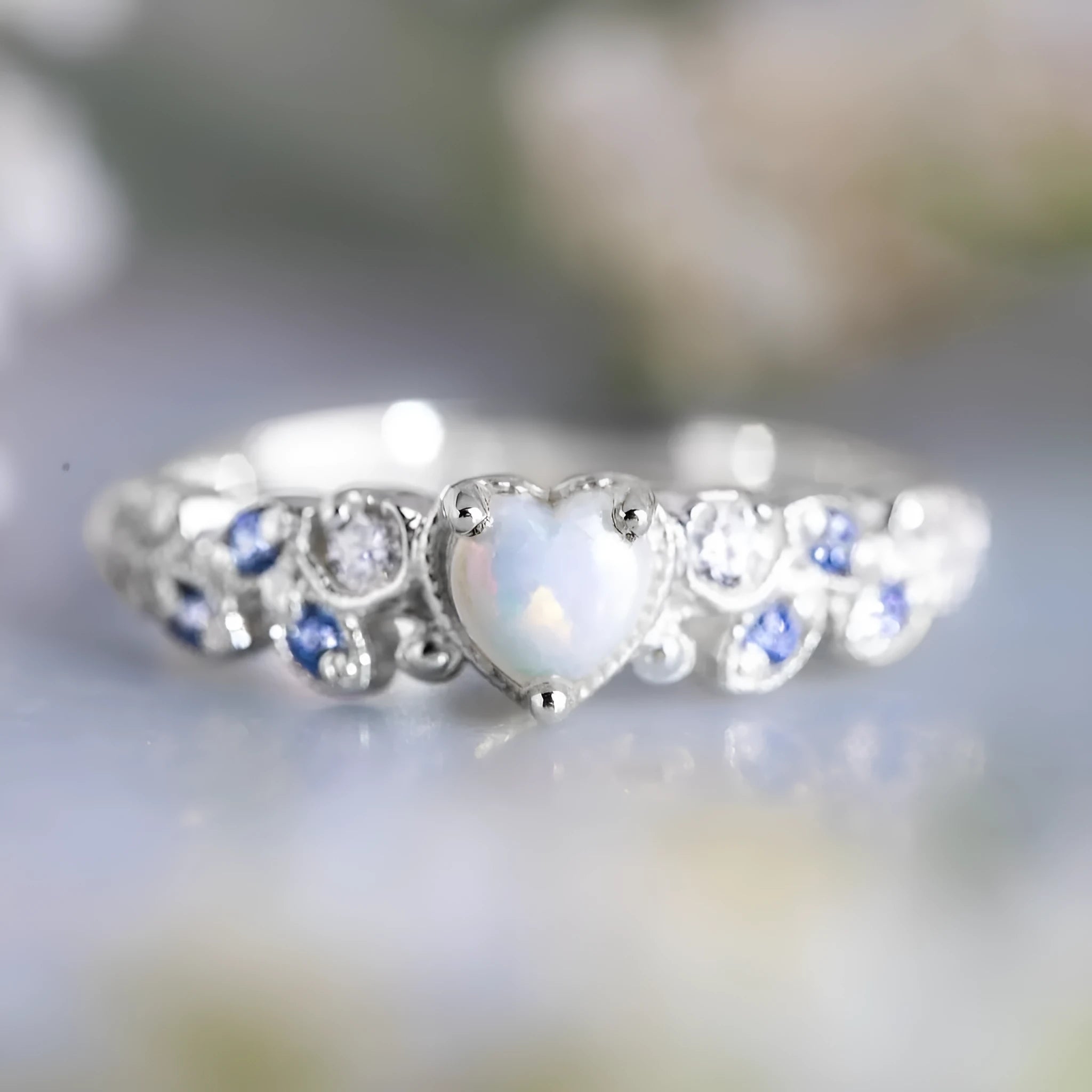 White heart-shaped alloy ring for women, shown in size selection from 5 to 11.