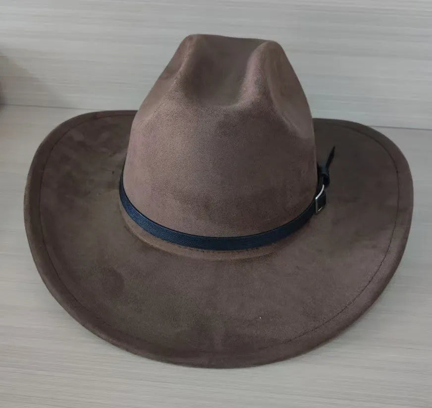 Brown leather velvet curved-edge western cowboy hat with a conical crown on a plain background.