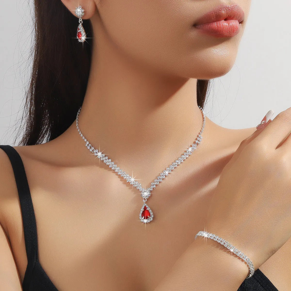 Claw chain necklace and earrings set with water drop rhinestone pendants in multiple colour options