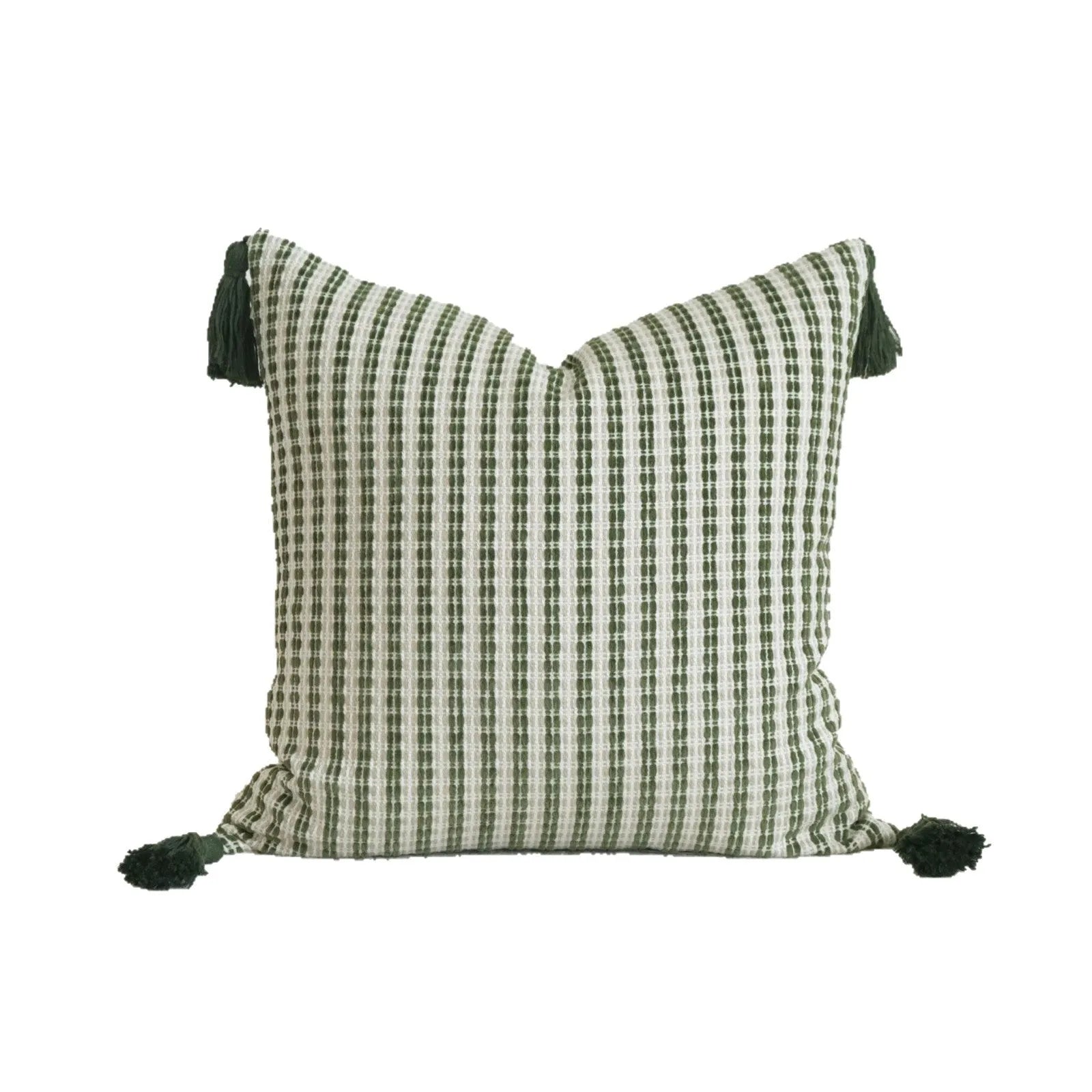 Green striped and botanical pattern decorative pillow set with tassel detail for hotel sample rooms.