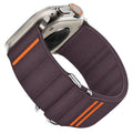 Elastic nylon Apple Watch compatible band with stainless steel buckle shown in multiple colour options