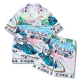 Men's and women's plaid print beach shirt and trouser casual outfit set on a hanger.