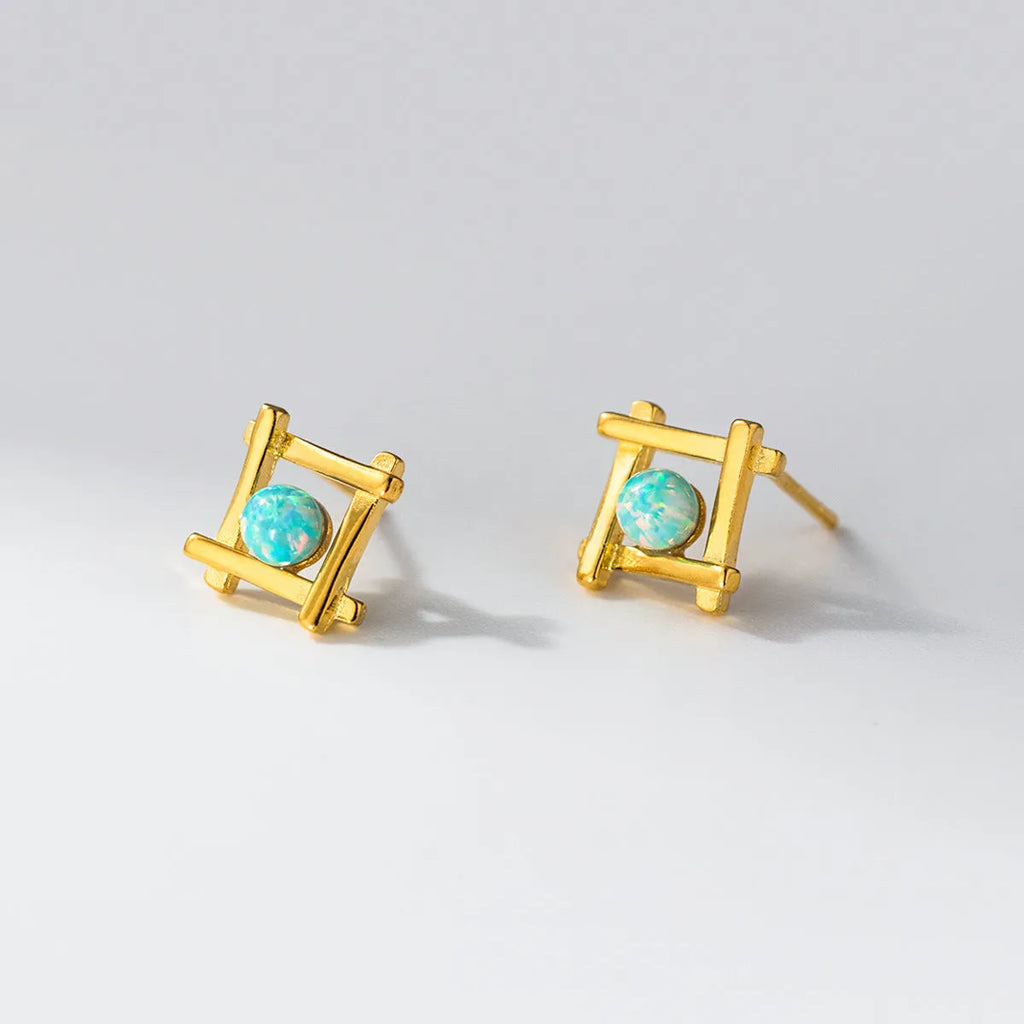 Geometric cross quadrangle stud earrings in 925 silver with silver or gold finish options