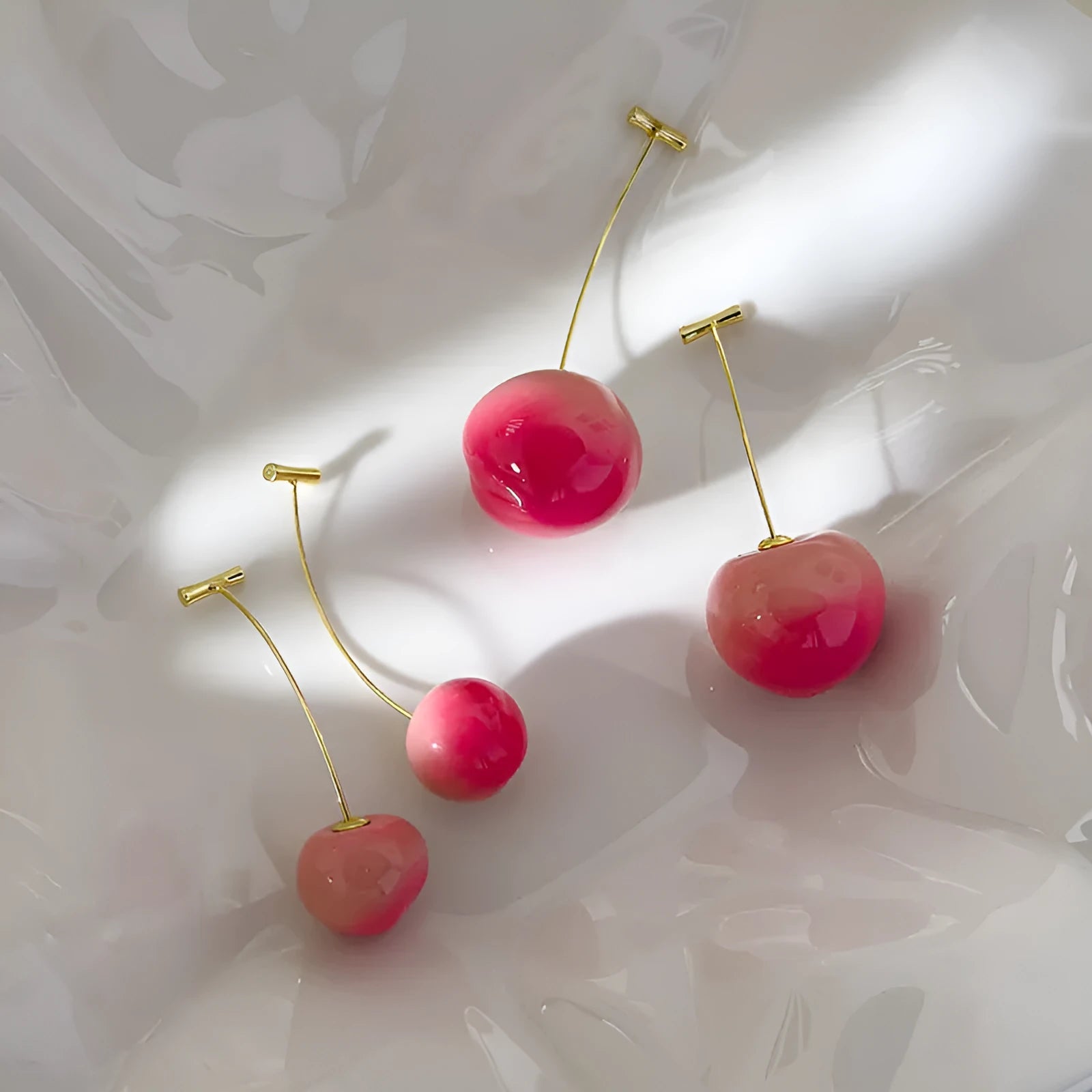 Acrylic peach fruit earrings in small and large size variations with copper findings