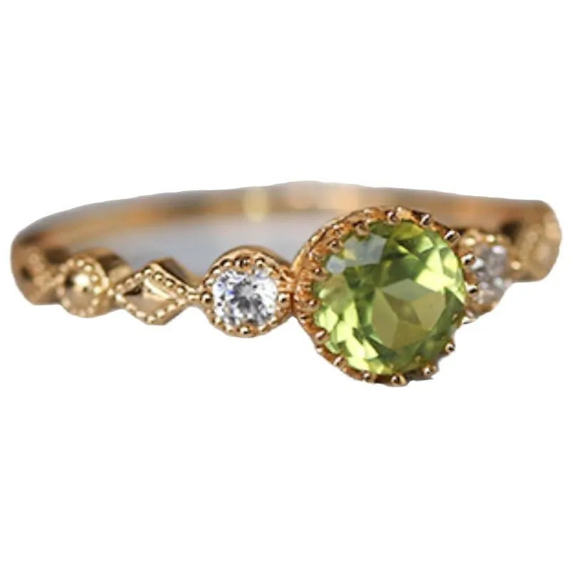 Japanese style geometric copper ring with quadrilateral design and imitation peridot colouration