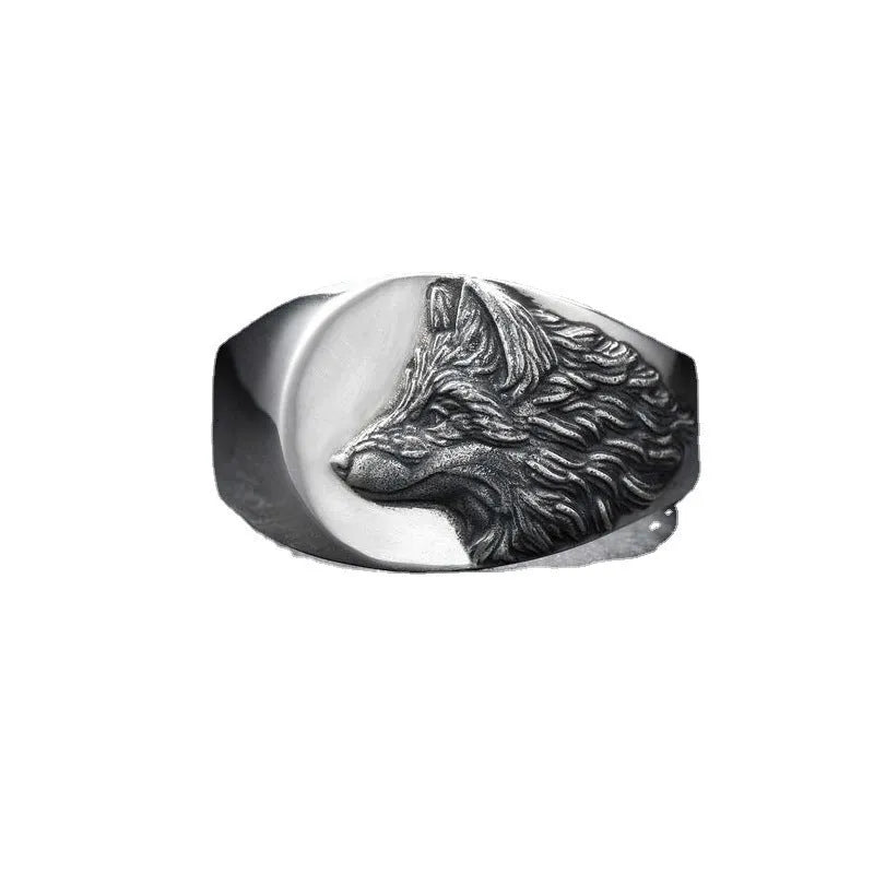 Silver geometric wolf head men's ring shown from multiple angles on a hand