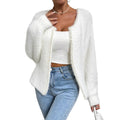 White women's V-neck cardigan sweater made from polyester knit fabric