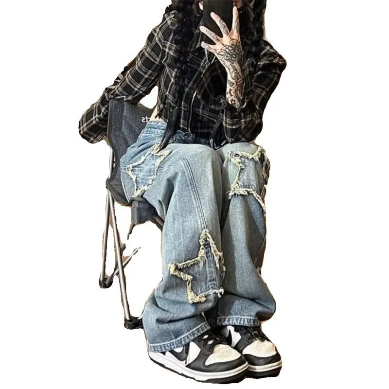 Blue high-waist straight-leg women's denim trousers on a hanger.