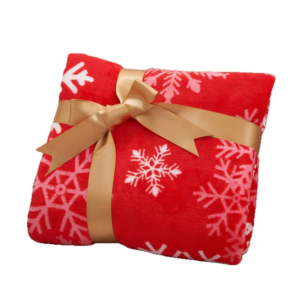 Soft flannel Christmas blanket in a solid colour, shown folded to display its plush texture and American style.