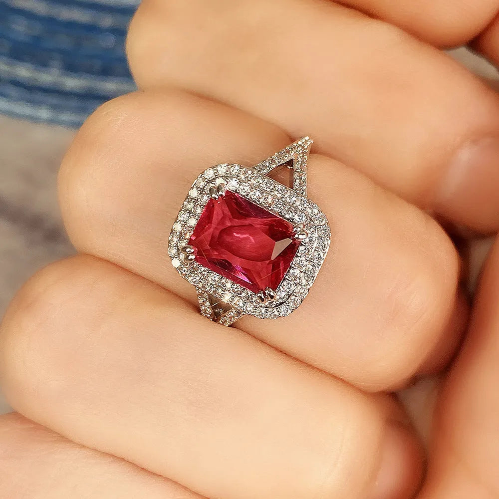 Red copper square geometric ring with rhinestone centrepiece for women, showing metallic construction