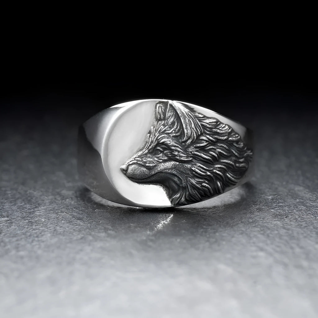 Silver geometric wolf head men's ring shown from multiple angles on a hand