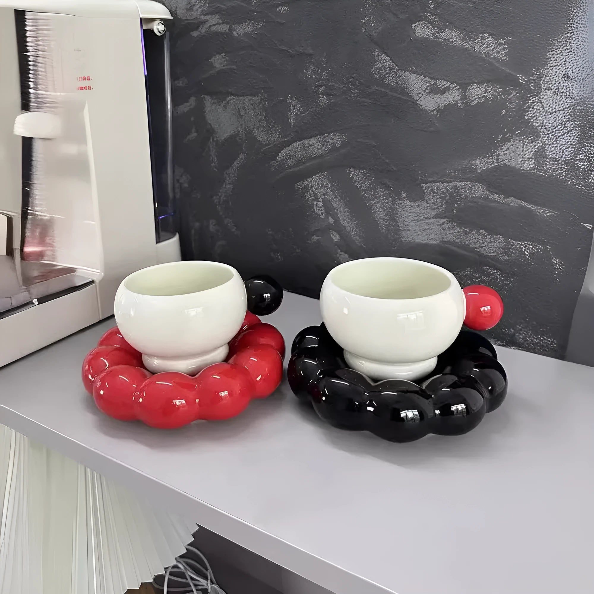 Nordic style ceramic coffee set with a 250ml cup and matching dish in a solid colour.