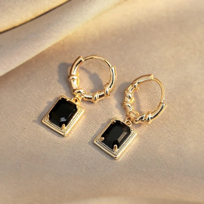 Geometric quadrilateral copper earrings with black zircon detailing in E2506 Black colour