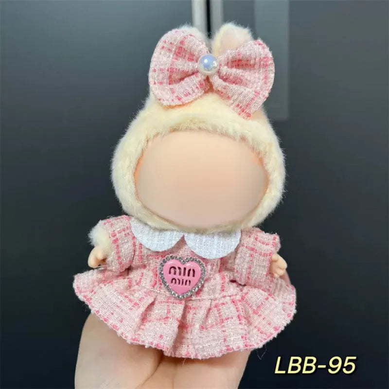 Plastic doll clothes costume for a 17cm vinyl action figure on a white background