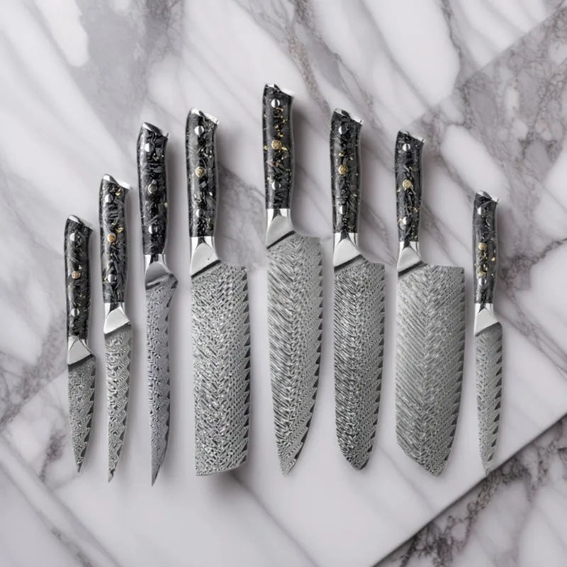 Damascus steel kitchen knife set showing eight different blade sizes with fishbone pattern detailing