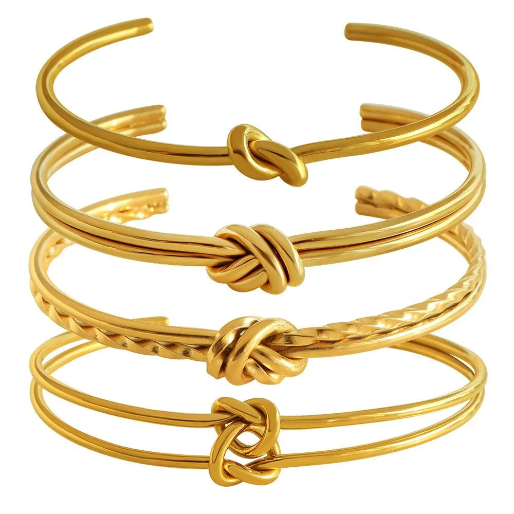 Gold plated stainless steel knotted C-shaped open double-layer adjustable women's bracelet.
