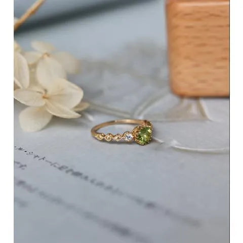 Japanese style geometric copper ring with quadrilateral design and imitation peridot colouration