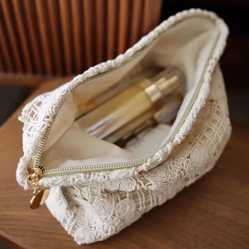 Handmade crocheted hollow flower cosmetic bag in corduroy fabric with ethnic embroidery decoration