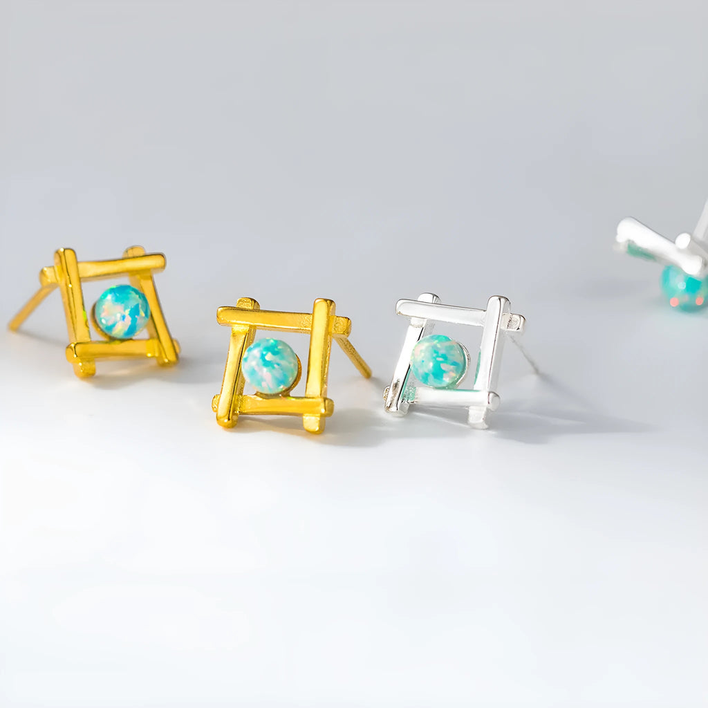 Geometric cross quadrangle stud earrings in 925 silver with silver or gold finish options