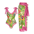 Women's solid colour one-piece swimsuit with thin spaghetti straps and a matching detachable skirt.