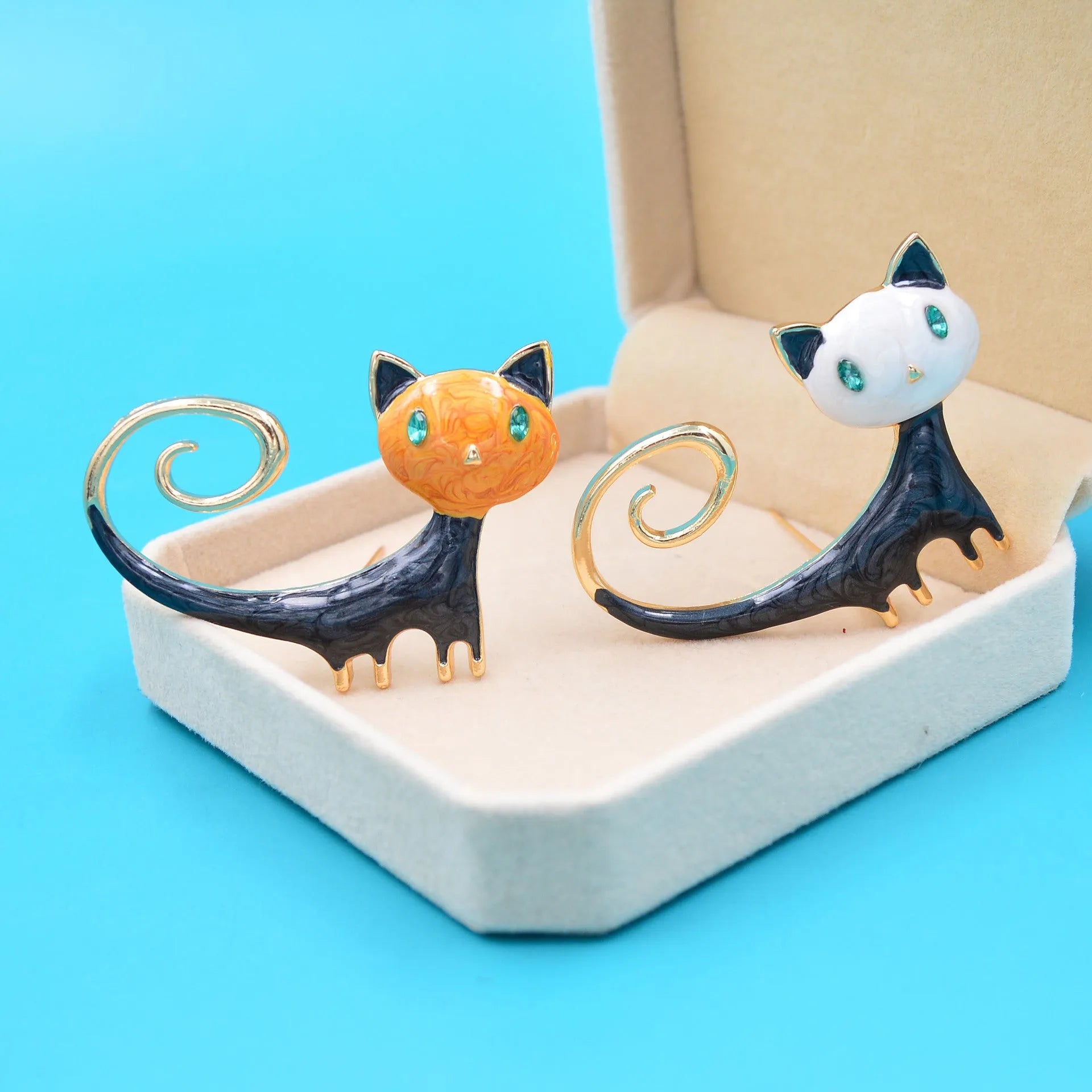 Personalised painted tail up kitty brooch in alloy metal with white or orange colour options