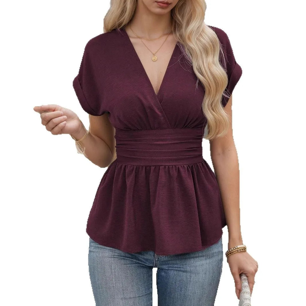 Women's black polyester V-neck top with pleated waist detail and short sleeves