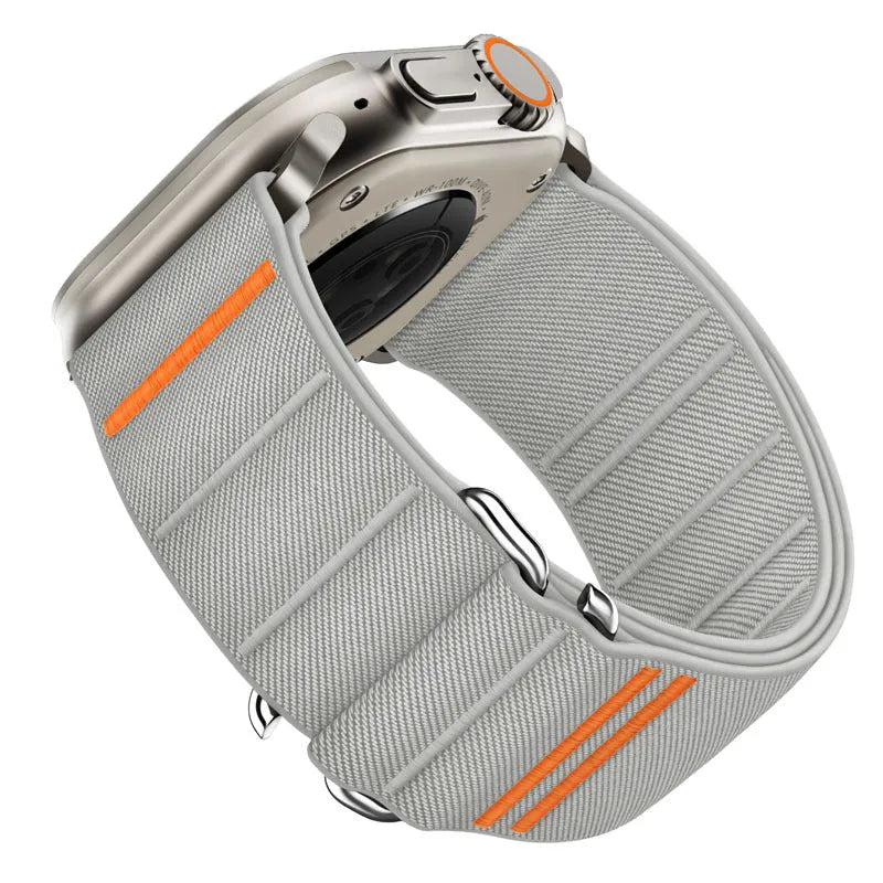 Elastic nylon Apple Watch compatible band with stainless steel buckle shown in multiple colour options