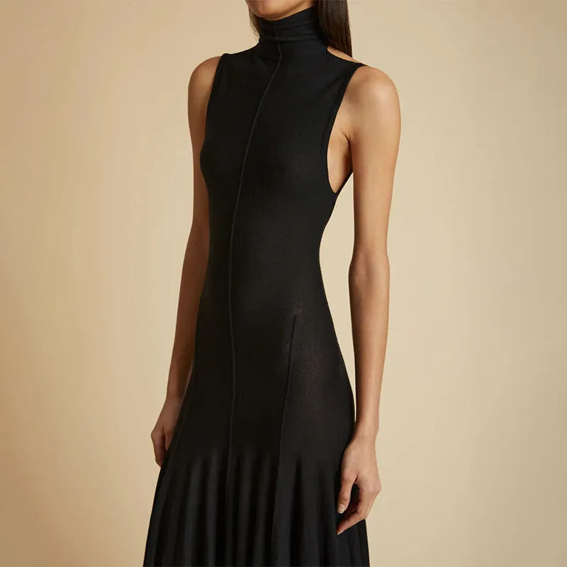 Grey slim-fit women's cotton dress with half turtleneck and backless design on a hanger.