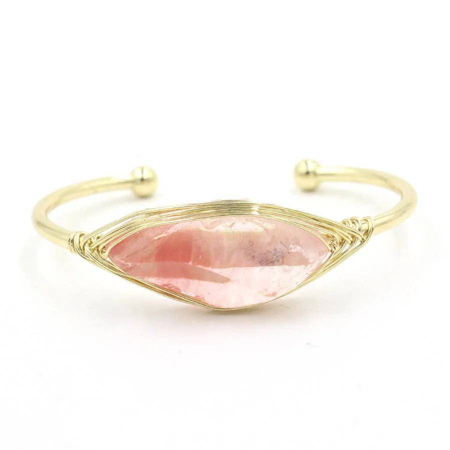 Natural raw gemstone bracelet with amorphous 8mm beads and a simple metal opening clasp.