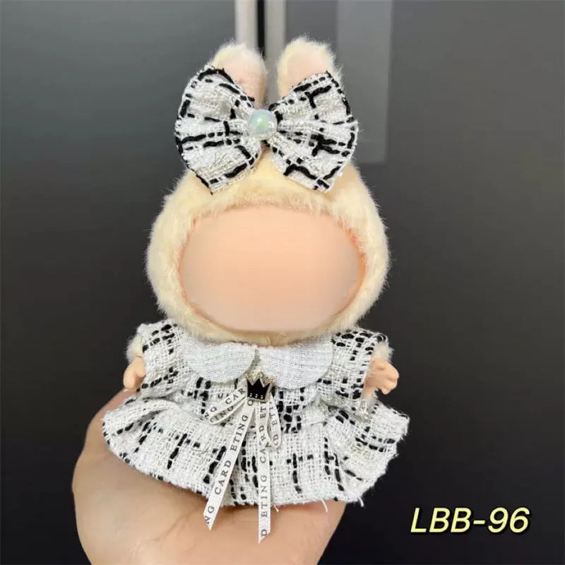 Plastic doll clothes costume for a 17cm vinyl action figure on a white background